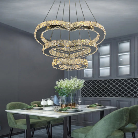 A luxurious chandelier designed in the shape of a heart with an adjustable stainless steel ring and a LED lamp Yahav's home lighting